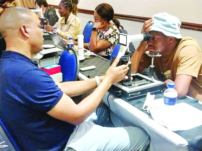 One of the seed instructors using the Al-assisted diagnostic equipment during the launch