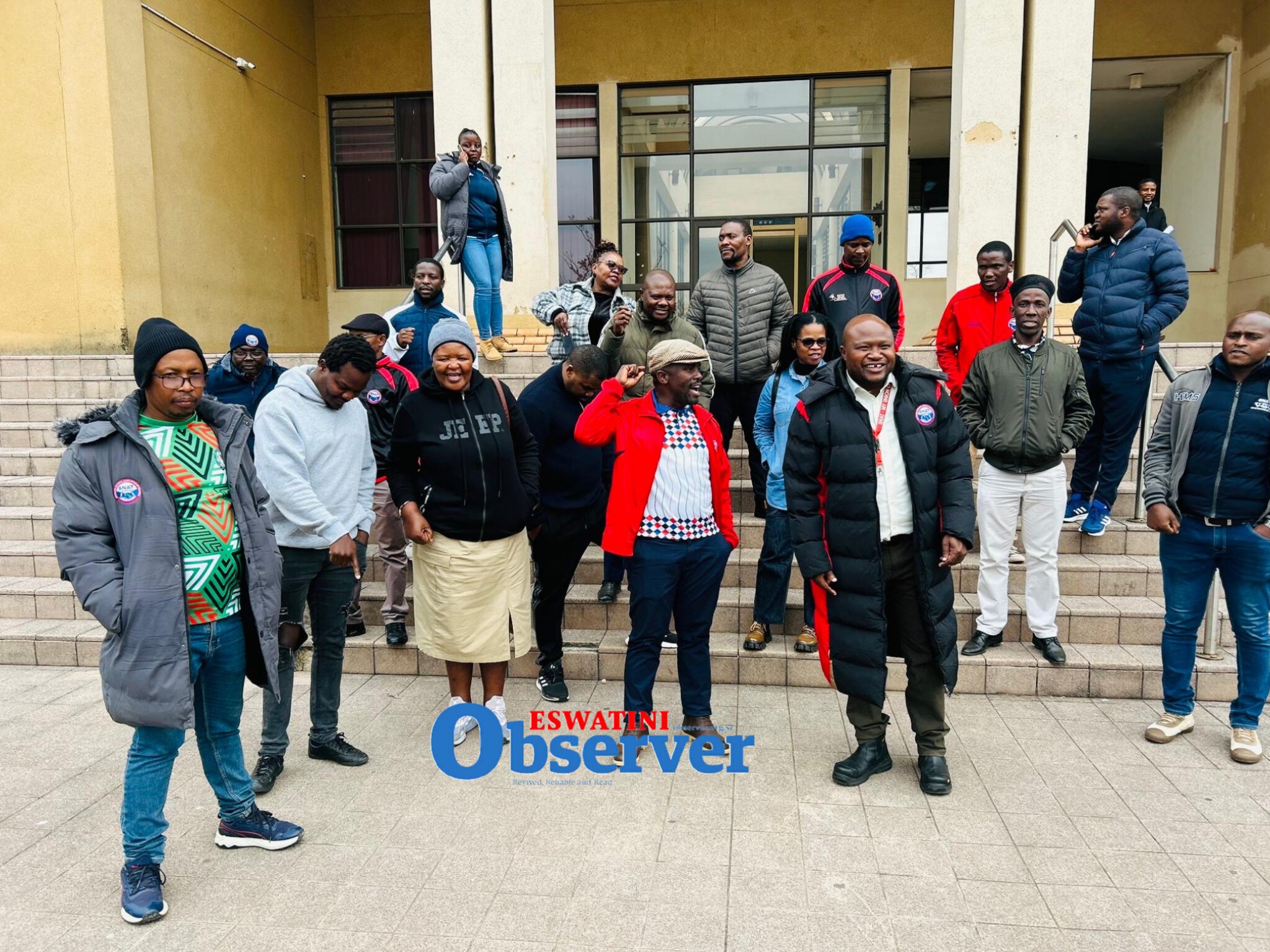 SNAT President Mbongwa Dlamini with SNAT members during a recent court visit.