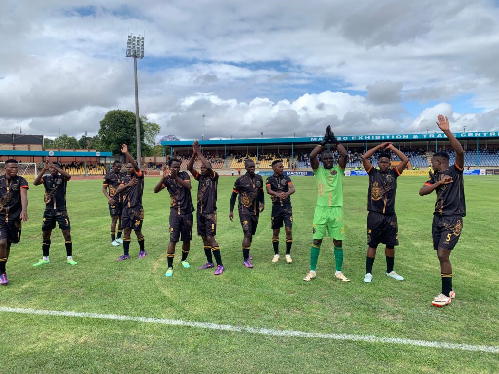 Mbabane Highlanders AM players greeting their fans.