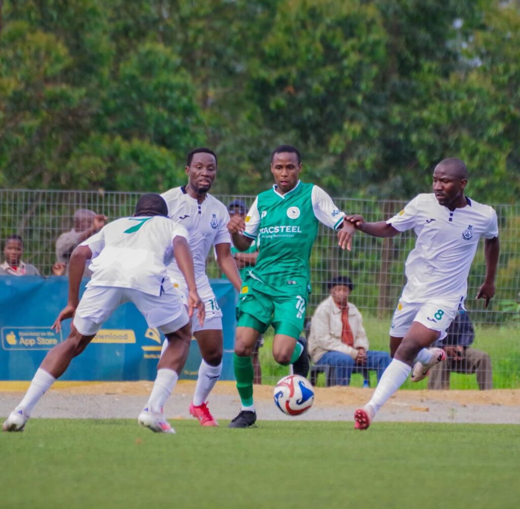 Green Mamba players marking Thubelihle Mavuso in a recent match.