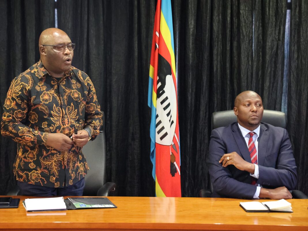 Government Spokesperson Alpheous Nxumalo with Prime Minister Russell Mmiso Dlamini. [Courtesy pic]