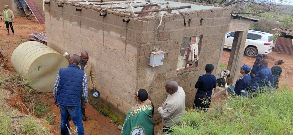 DPM Thuli Dladla with NDMA CEO and officials as well as Ndzingeni Inkhundla council assessing the storm aftermath at Aaron Matsebula’s homestead.