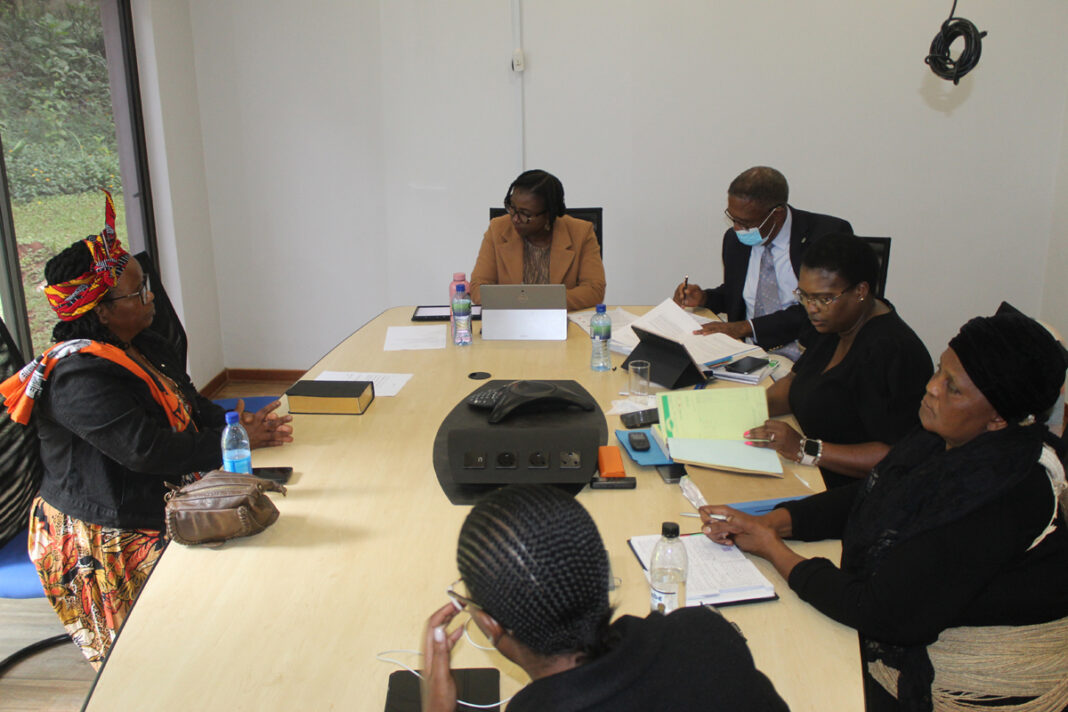 Commissioners taking down some notes as former Hlatikulu Town Board treasurer Sibongile Ndlovu gives her testimony during the commission of enquiry held at Ezulwini Town board yesterday.
