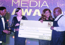 Media gets its groove back The Nation Magazine Editor Bheki Makhubu accepts his award for Editorial Leadership from Minister of ICT Savannah Maziya during the Media Awards held at the Royal Villas.