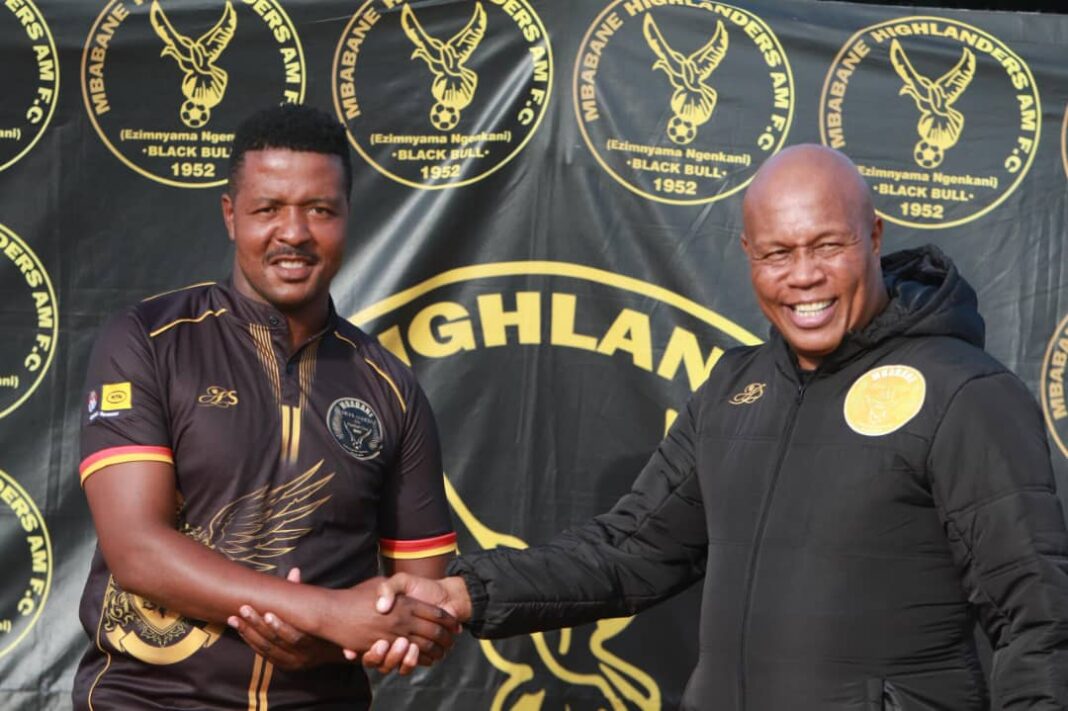 Phiwayinkhosi 'Slwabelwabe' Dlamini shaking hands with Mbabane Highlanders General Manager Richard Makhoba after signing for the club on December 23, 2025.