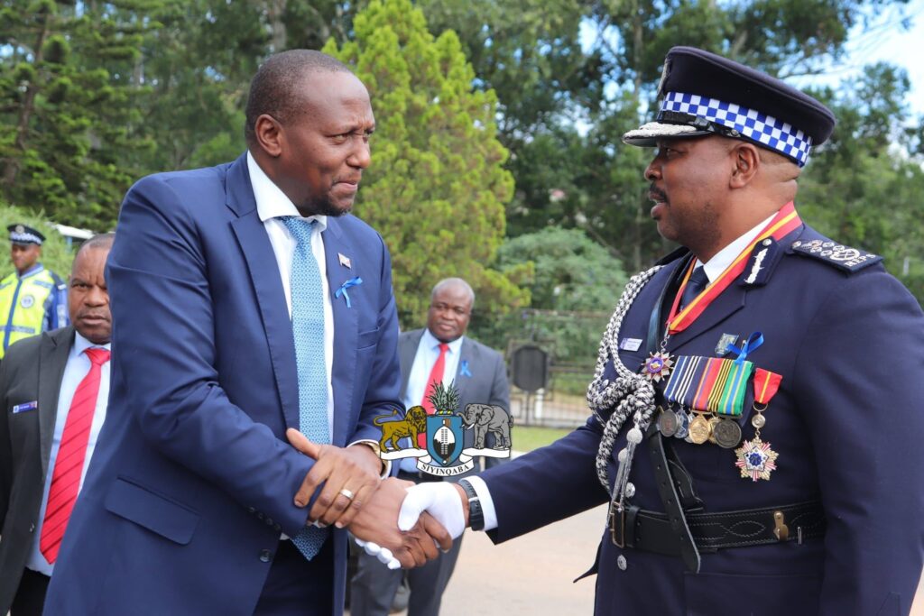 Prime Minister Russell Mmiso Dlamini exchanges greetings with National Commissioner of Police Manoma Vusi Masango during the International Day of Commemoration for Fallen Officers at the Mbabane Police Headquarters yesterday.